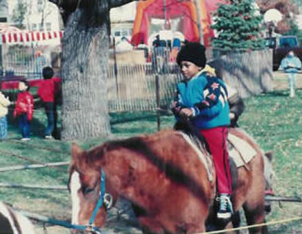 Pony Rides were so much fun at the Voter Registration Picnic experienced by the young boy on the pony.