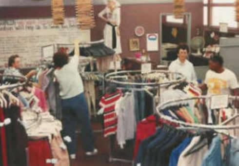 Volunteers restock the Clothing Closet.