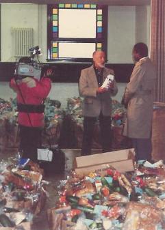 Pastor Paul is interviewed by a local TV station about the Thanksgiving GiveAway in 1985 featuring frozen Turkey Rice Soup prepared by the church.